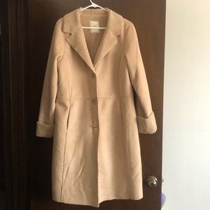 Women’s XL long coat with faux fleece interior, cuffs and collar. Vegan friendly